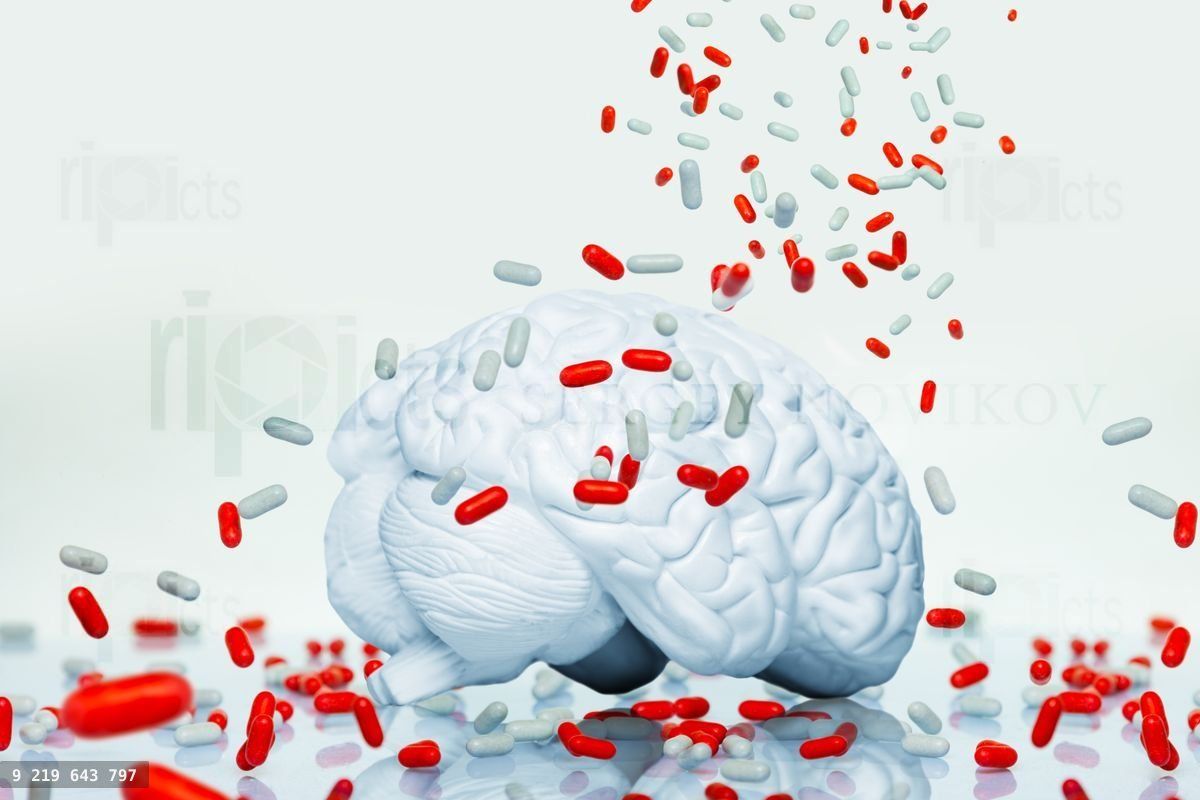 Brain illness and medication concept with pills