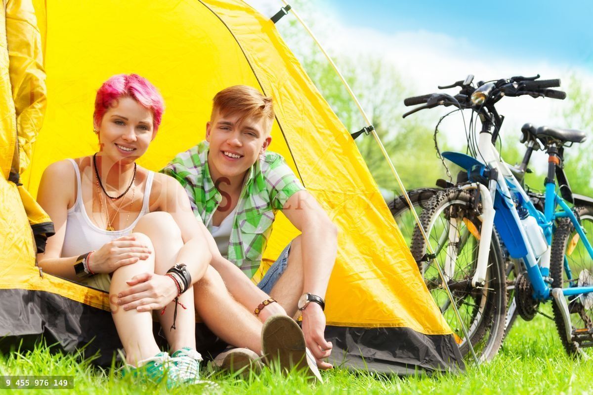 Couple sitting in a tent