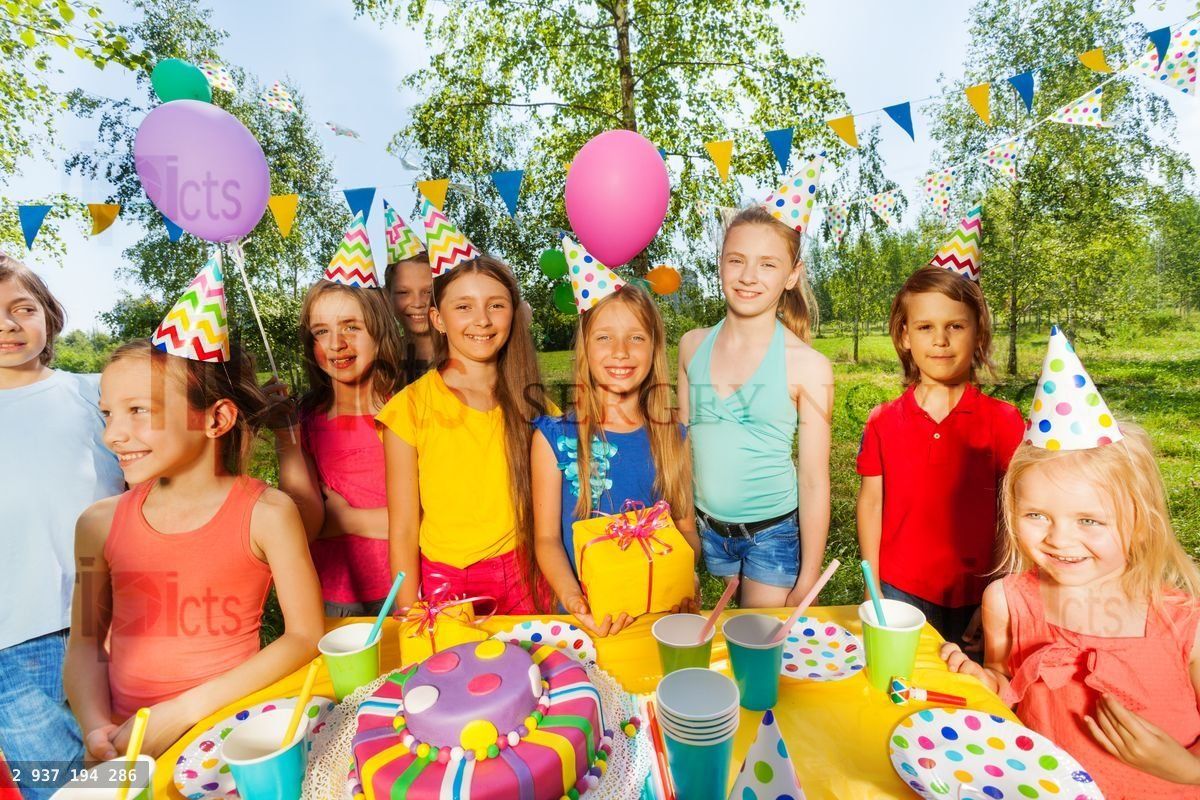 Funny kids at the outdoor birthday party