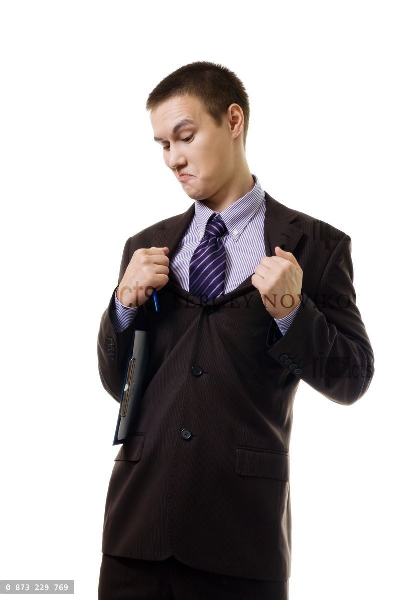 Young man in formal suit tear it apart because of wrong size