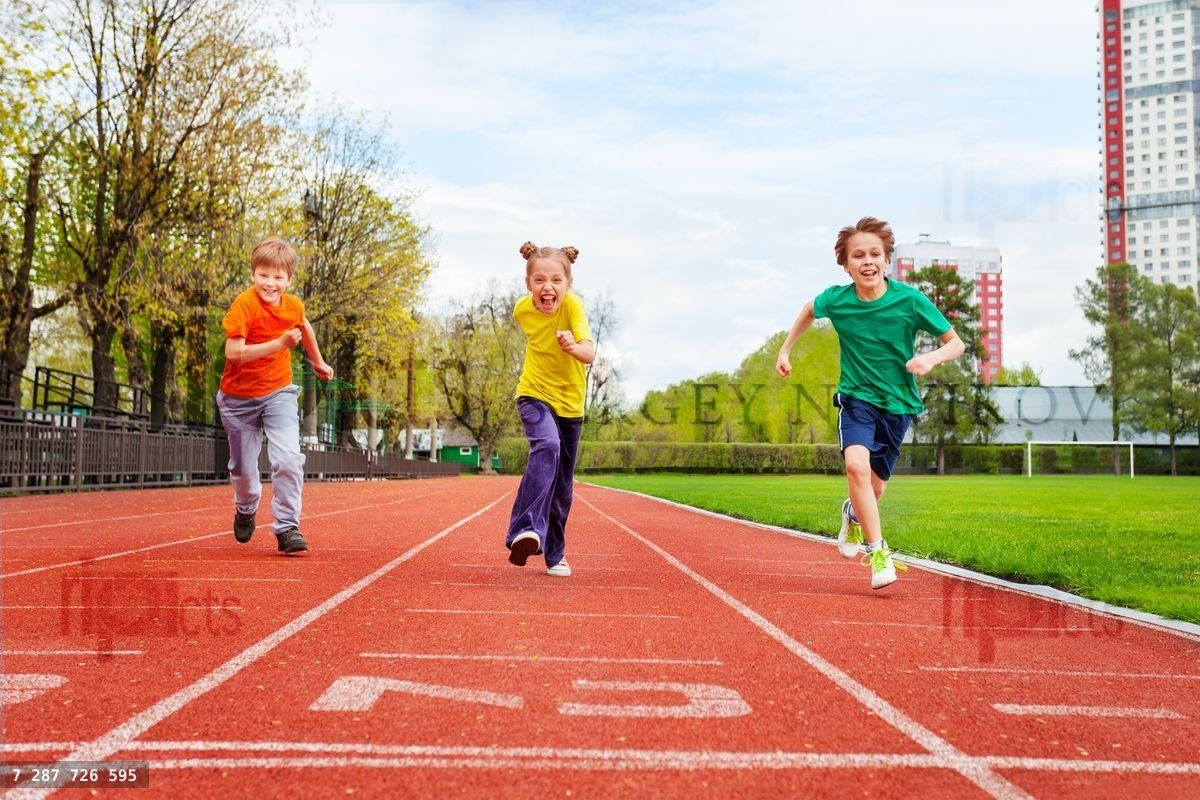 Children running the marathon on finish line