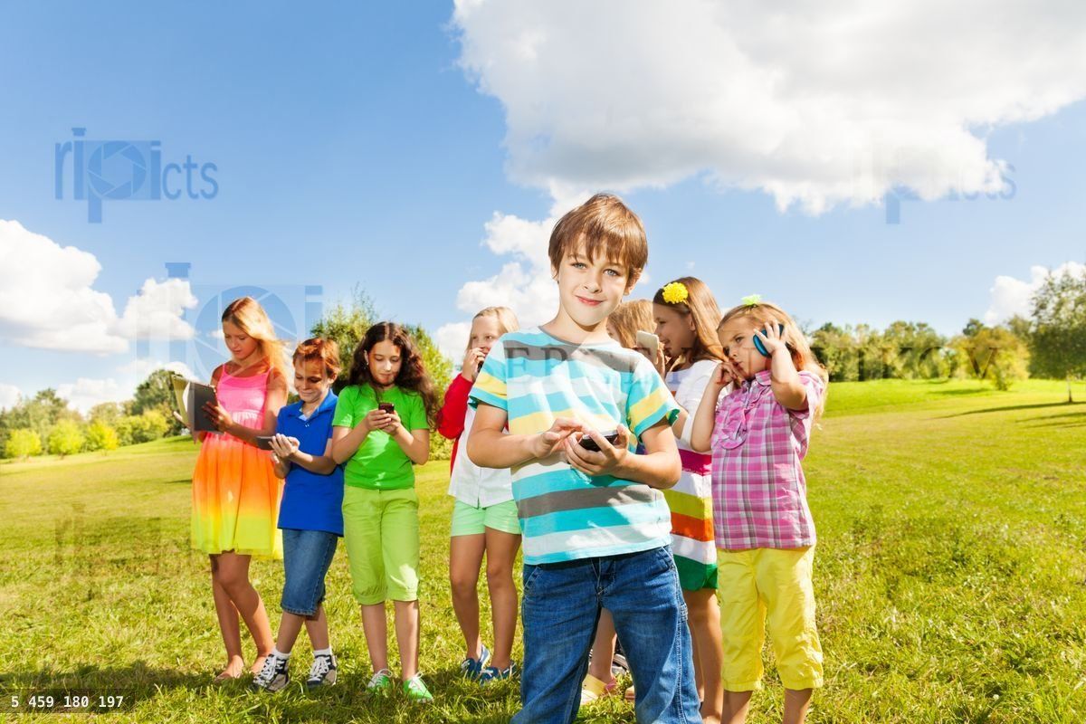 Boy with phone and friends