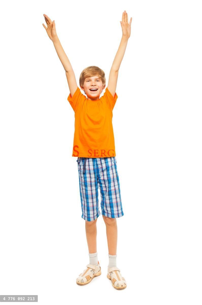 Young boy raises hands up