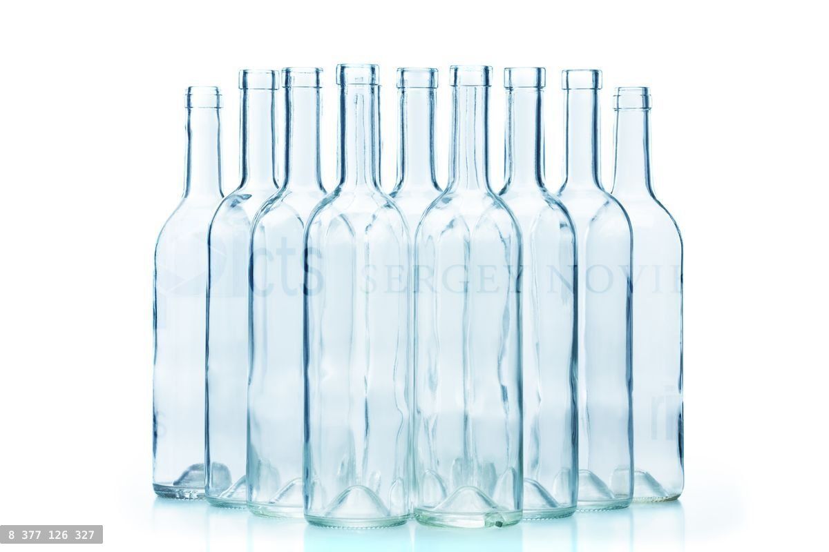 Group of empty glass bottles isolated on white