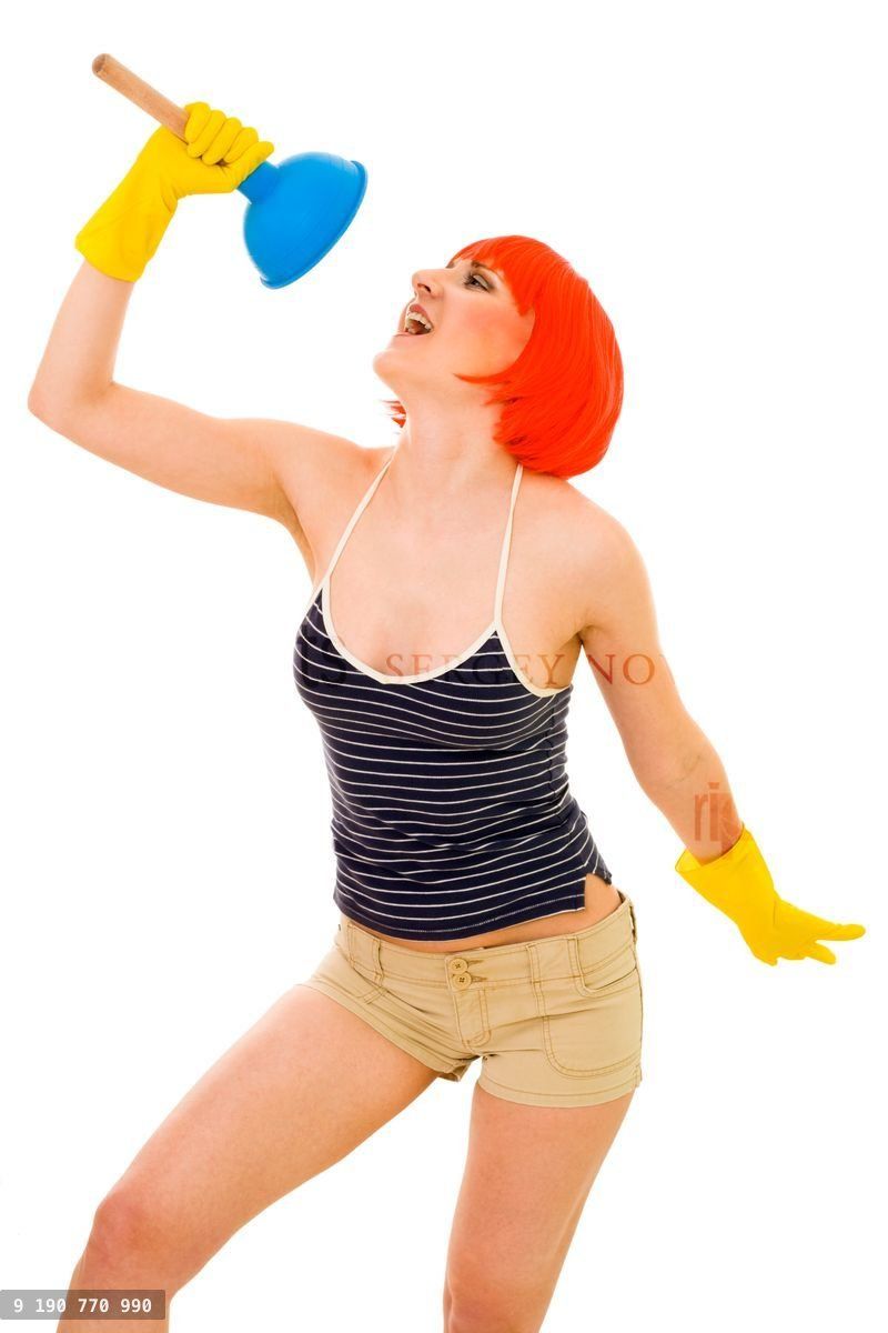 Woman singing while cleaning