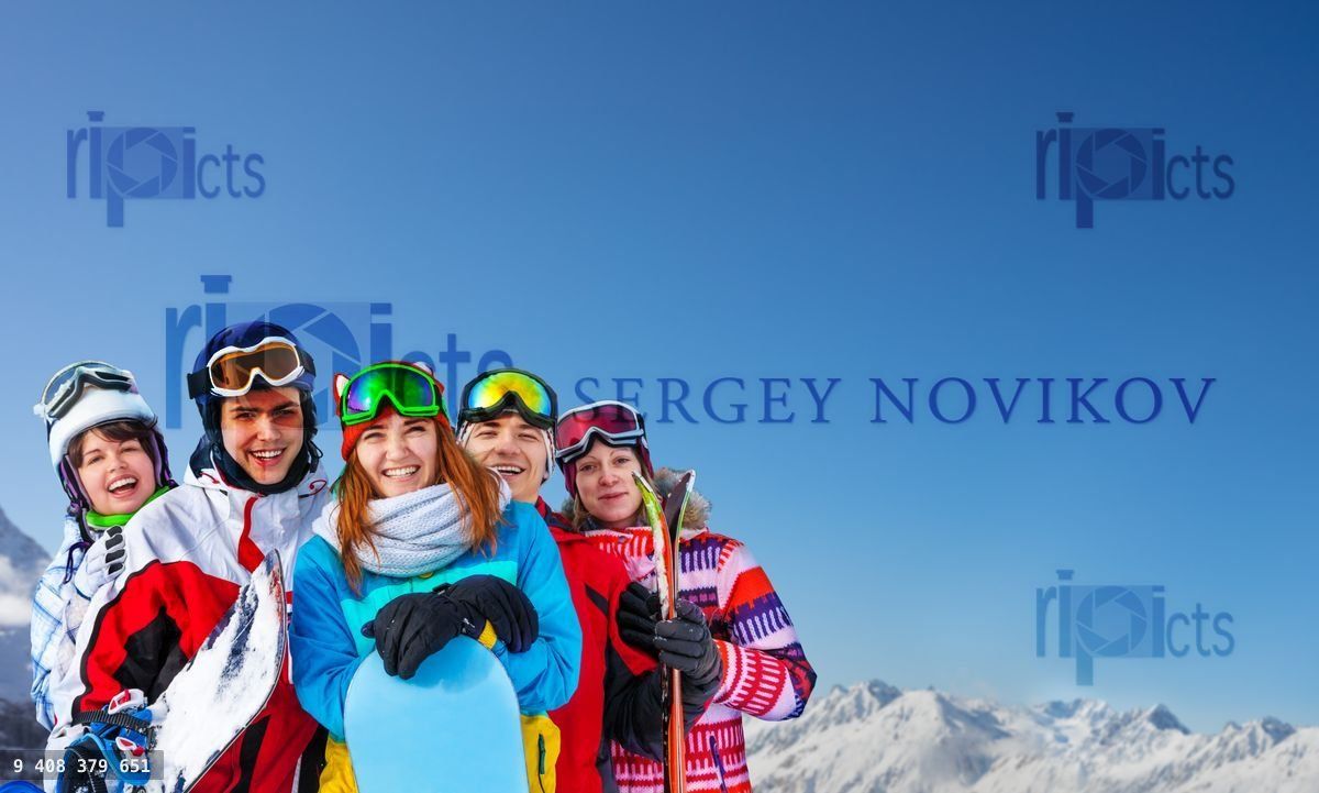 Young snowboarders close portrait over mountain