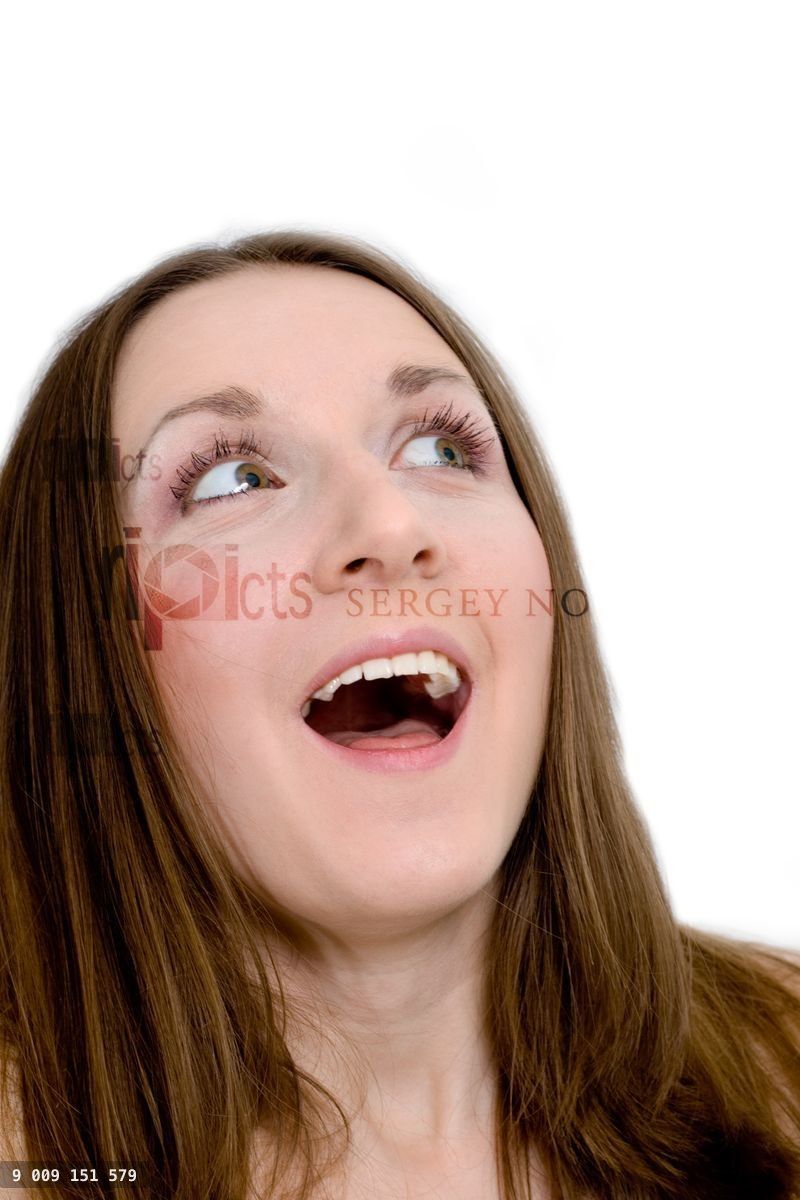 Woman looking up with an open mouth and a surprised expression