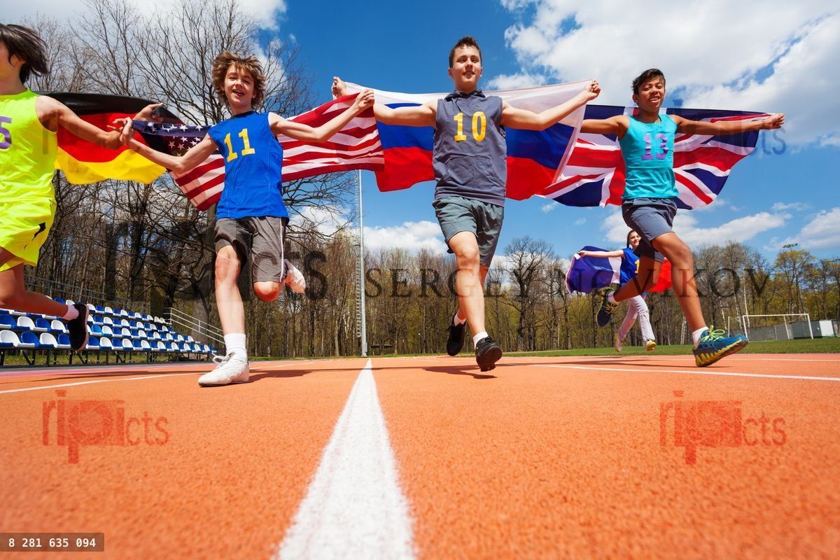 Four participants of international race with flags