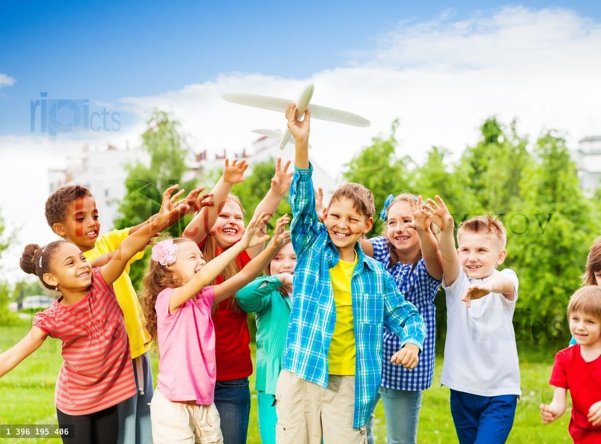 Kids reaching after white airplane toy with arms