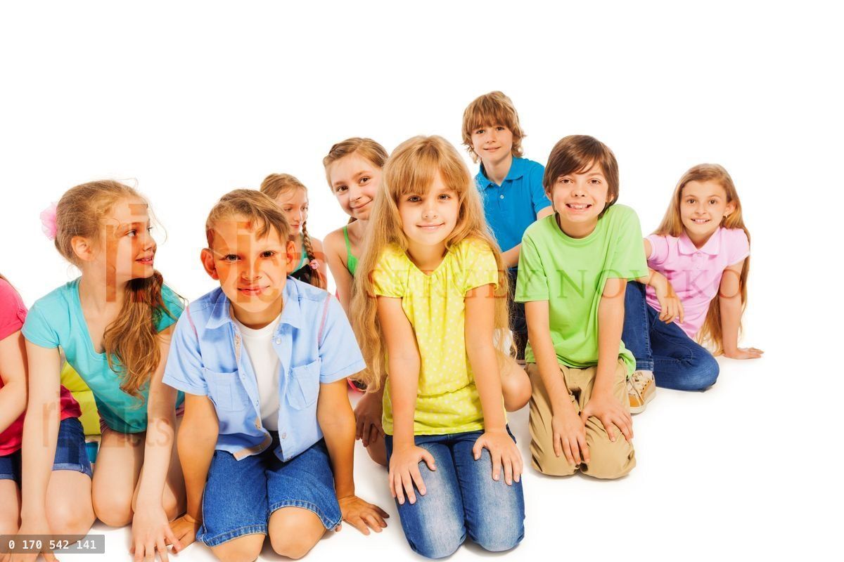 Happy 8 years old friends sitting together