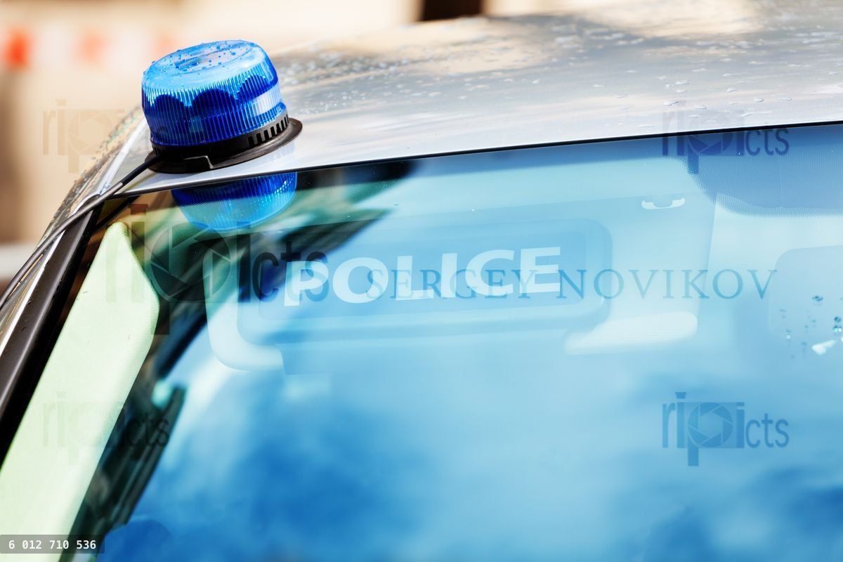French police car siren on the roof and sign