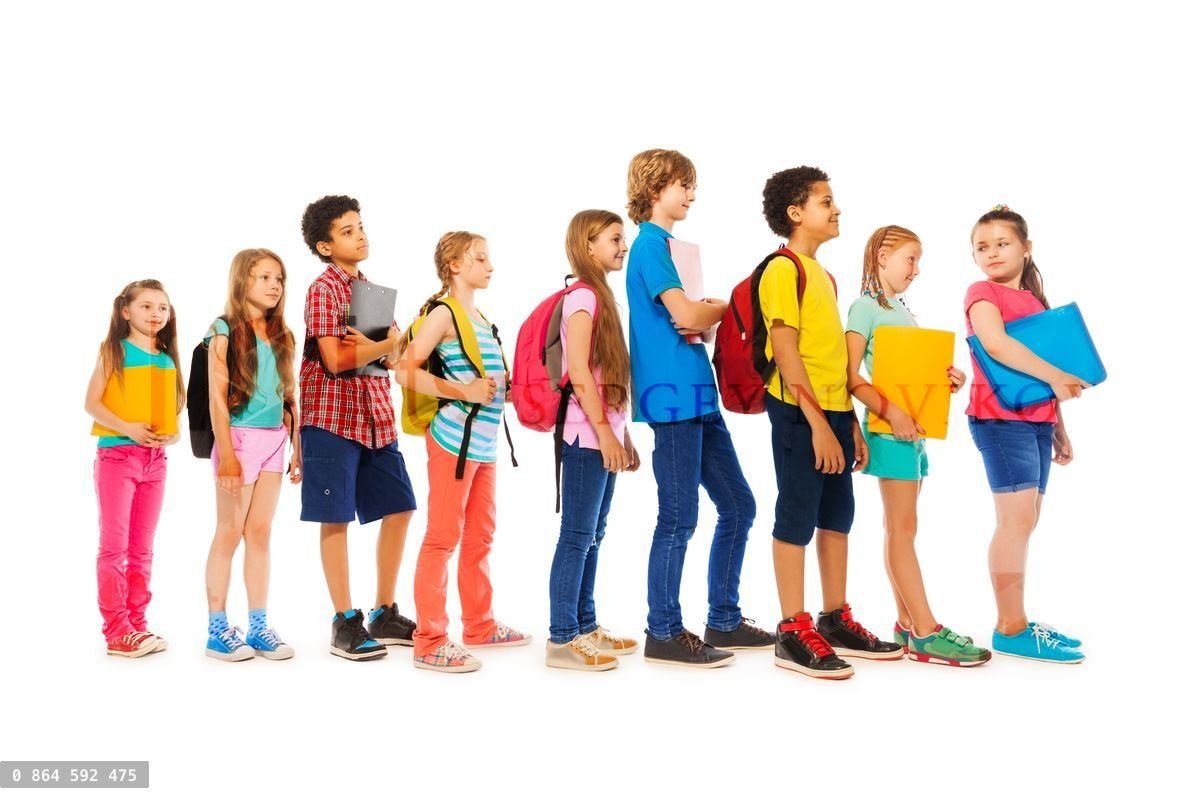Group of kids in a line side view