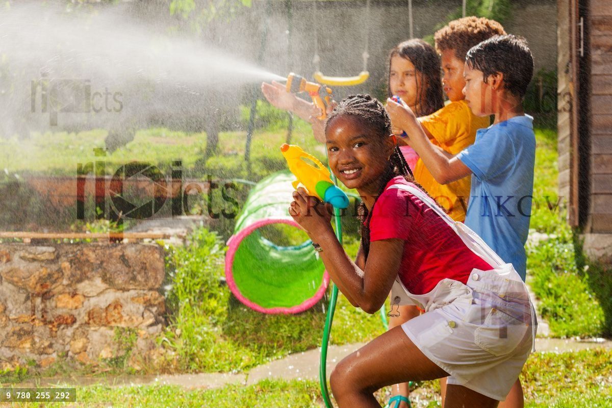 Girl and friends in water gun fight wet fun game