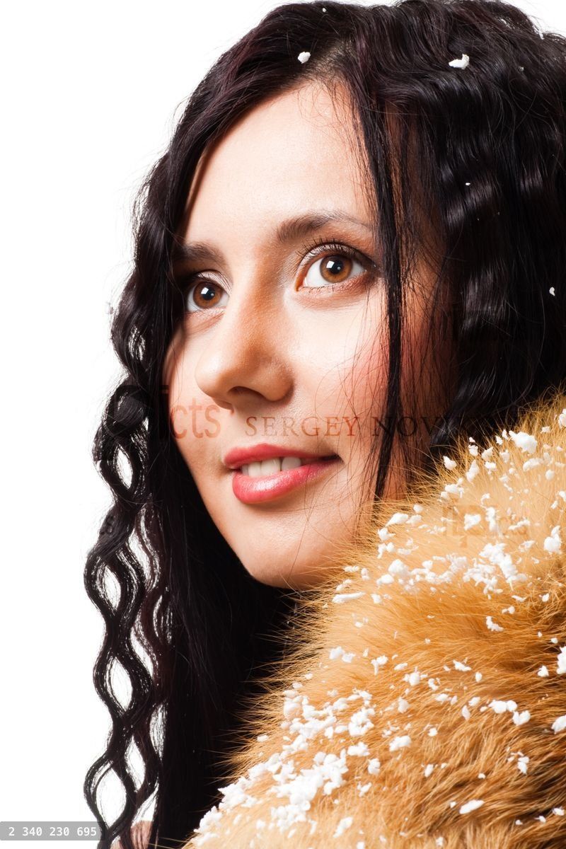 Woman with curly hair with fur