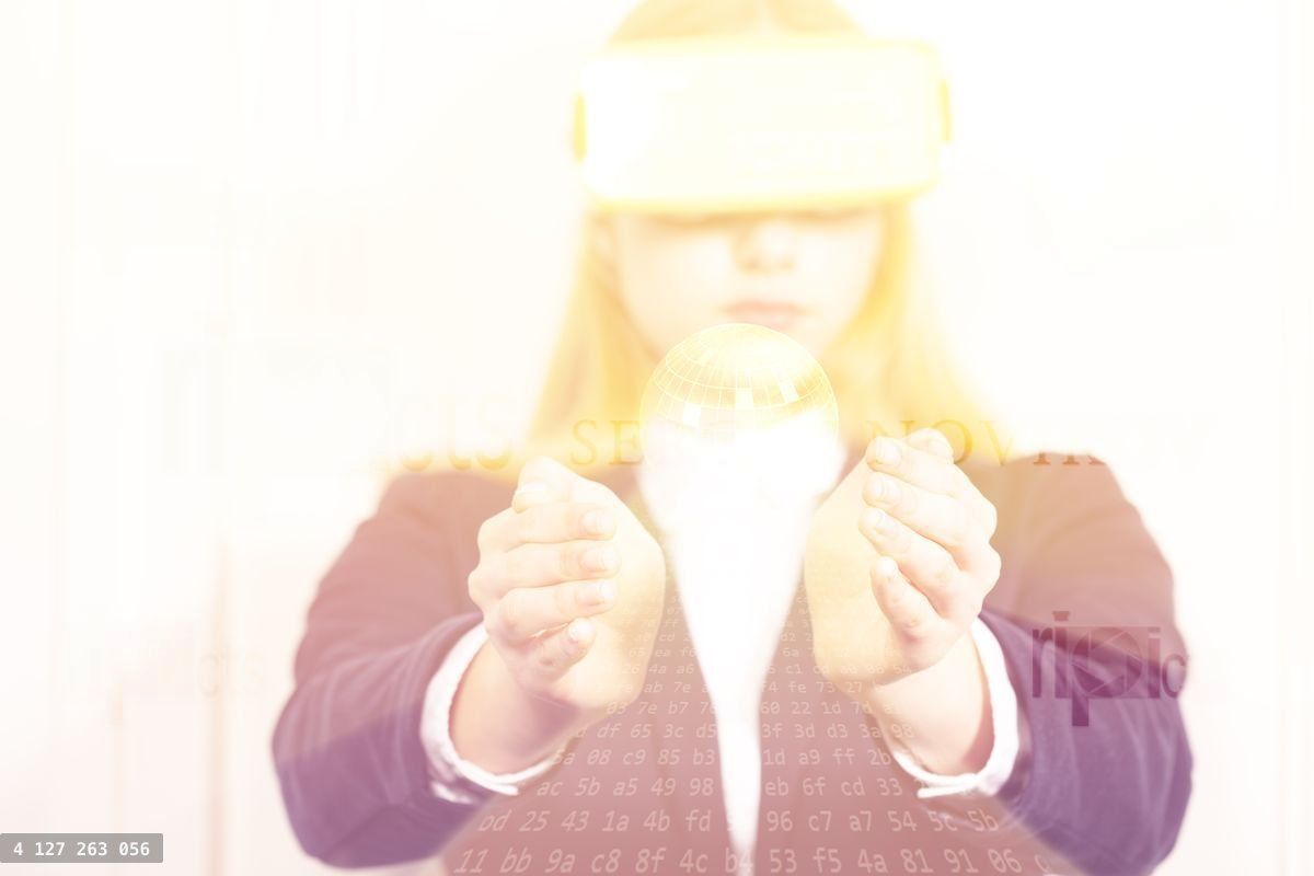 Young woman designer uses Virtual Reality headset