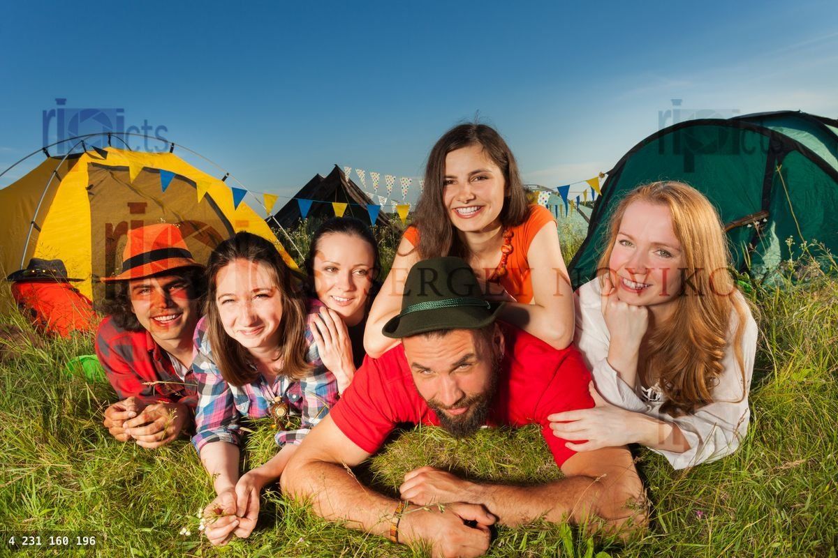 Funny young people enjoying with camping trip