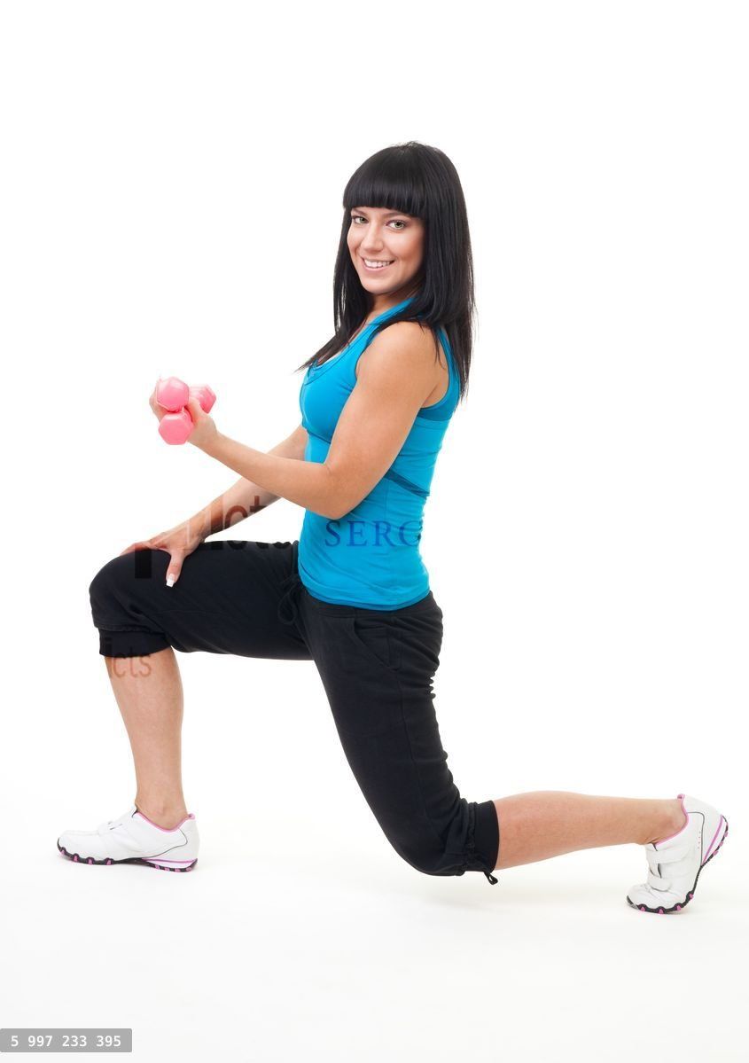Woman do fitness stand with dumbbells