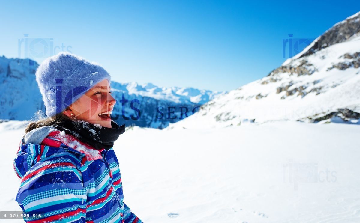 Young girl laugh smile, profile view over mountain