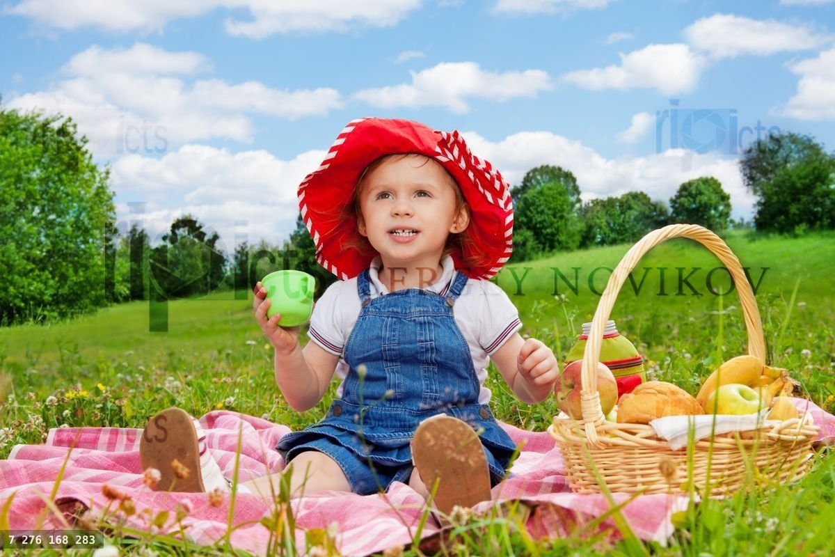funny little girl holding cup