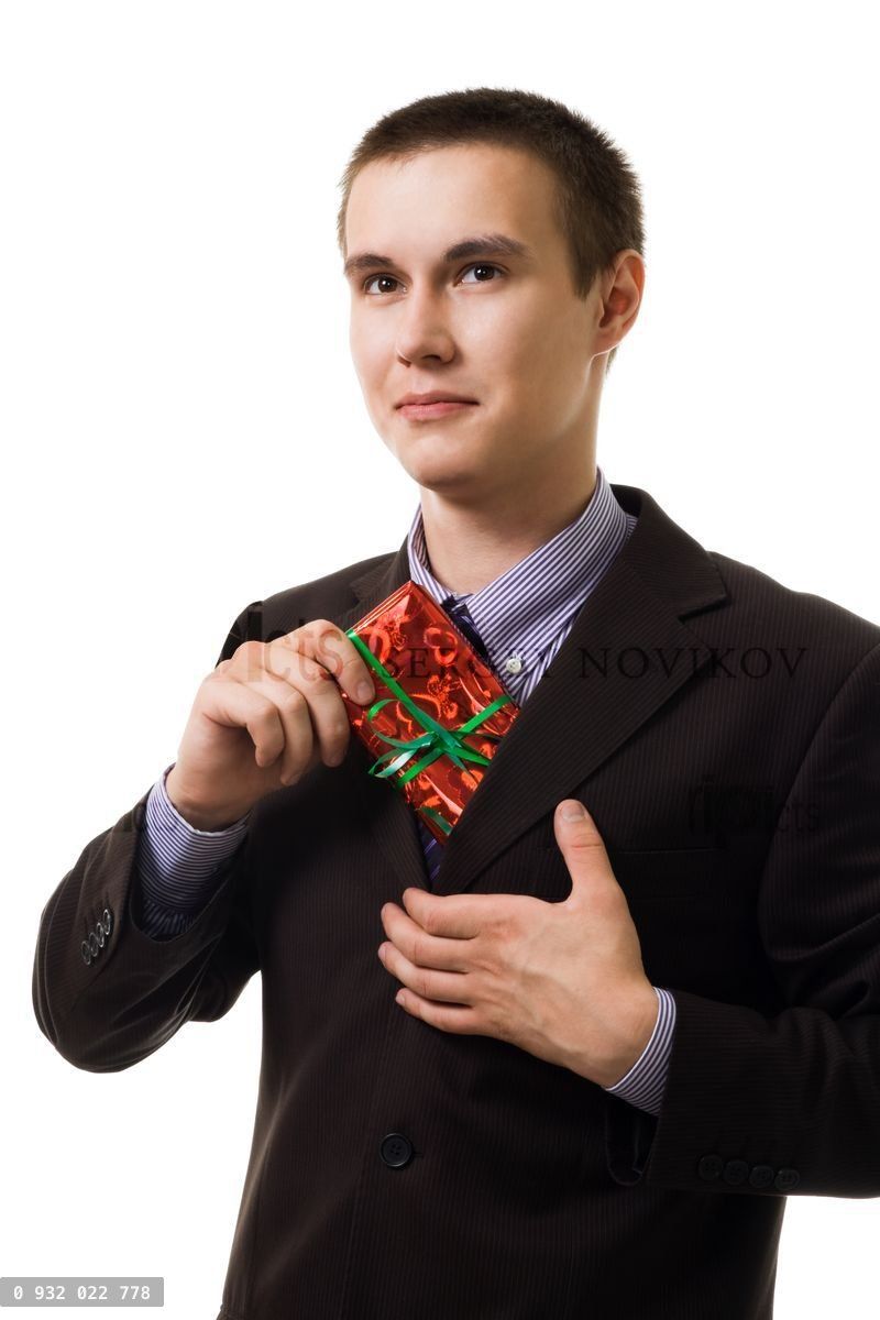 Young man with a red present
