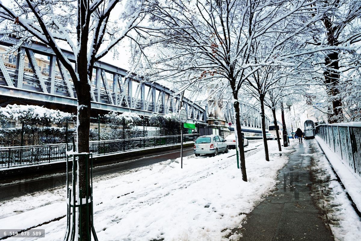 Boulevard de la Villette and metro line under snow