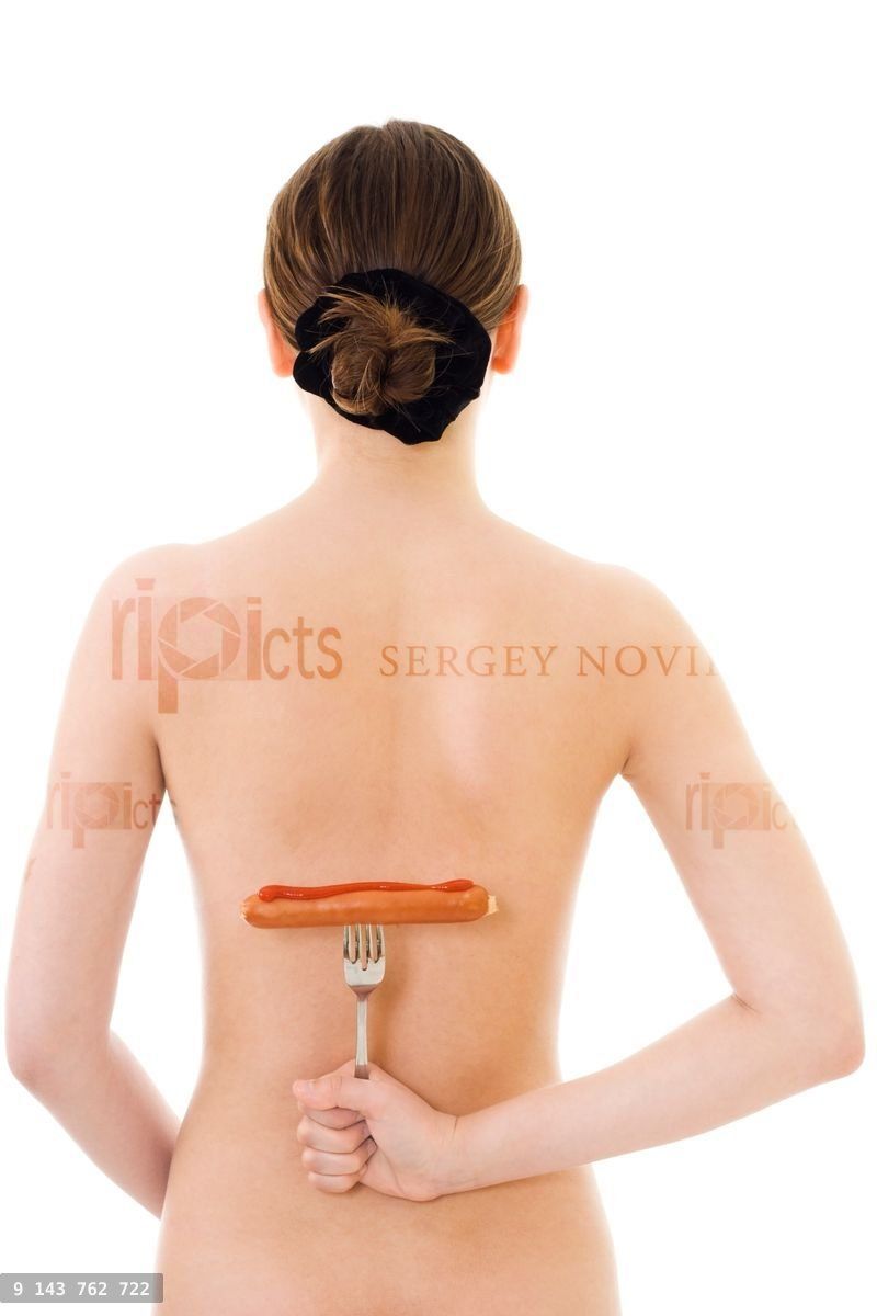 Young hot woman with sausage