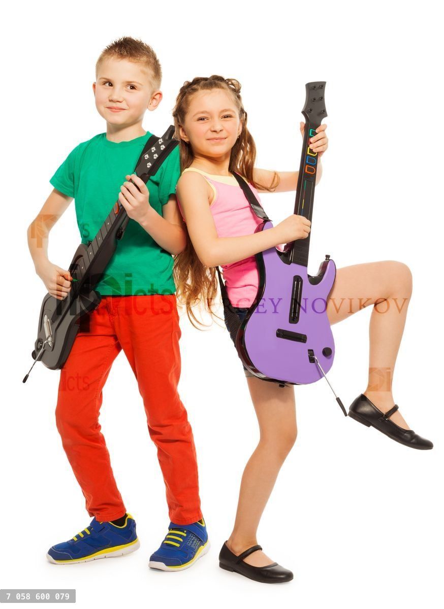 Girl and boy rock playing on electro guitars