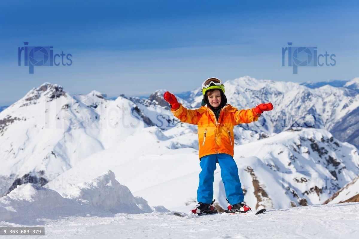 Happy boy skiing on Sochi ski resort, Russia