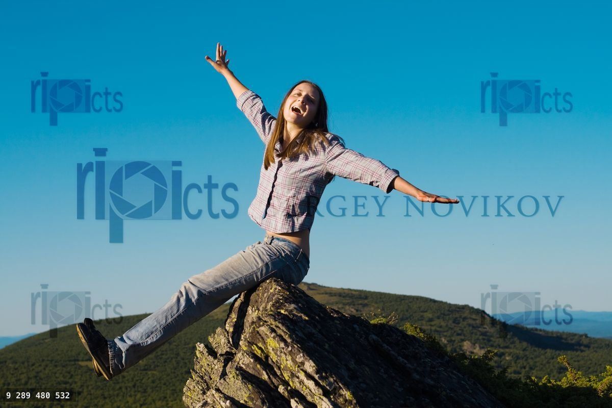 Woman on top of the wold