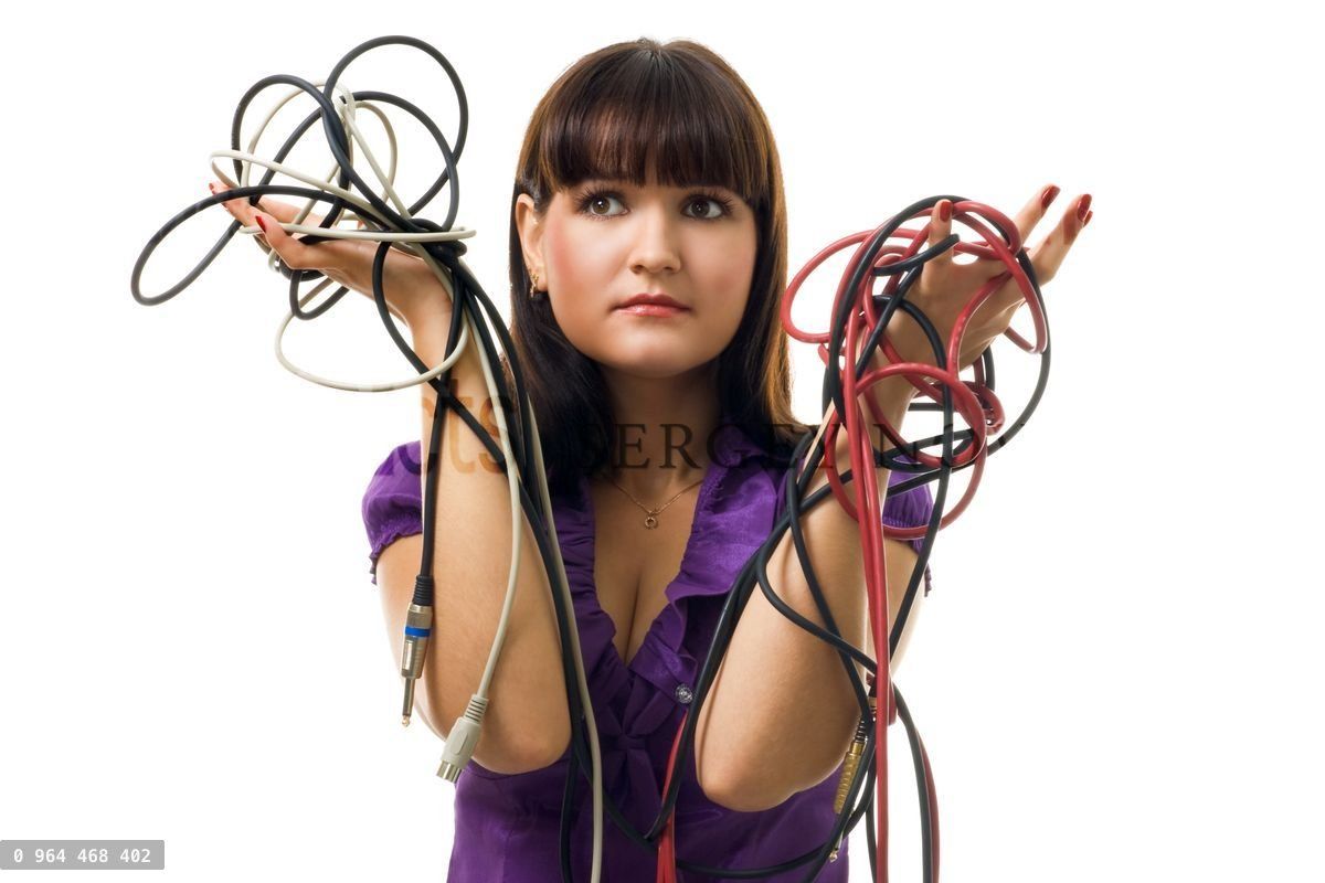 Young woman hold wires and have problem