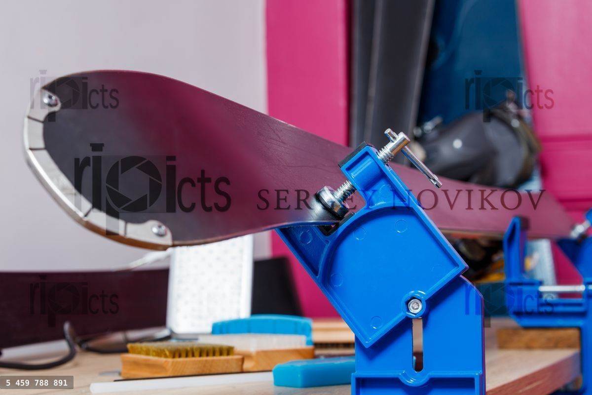 Workbench with alpine ski and tools for maintenance