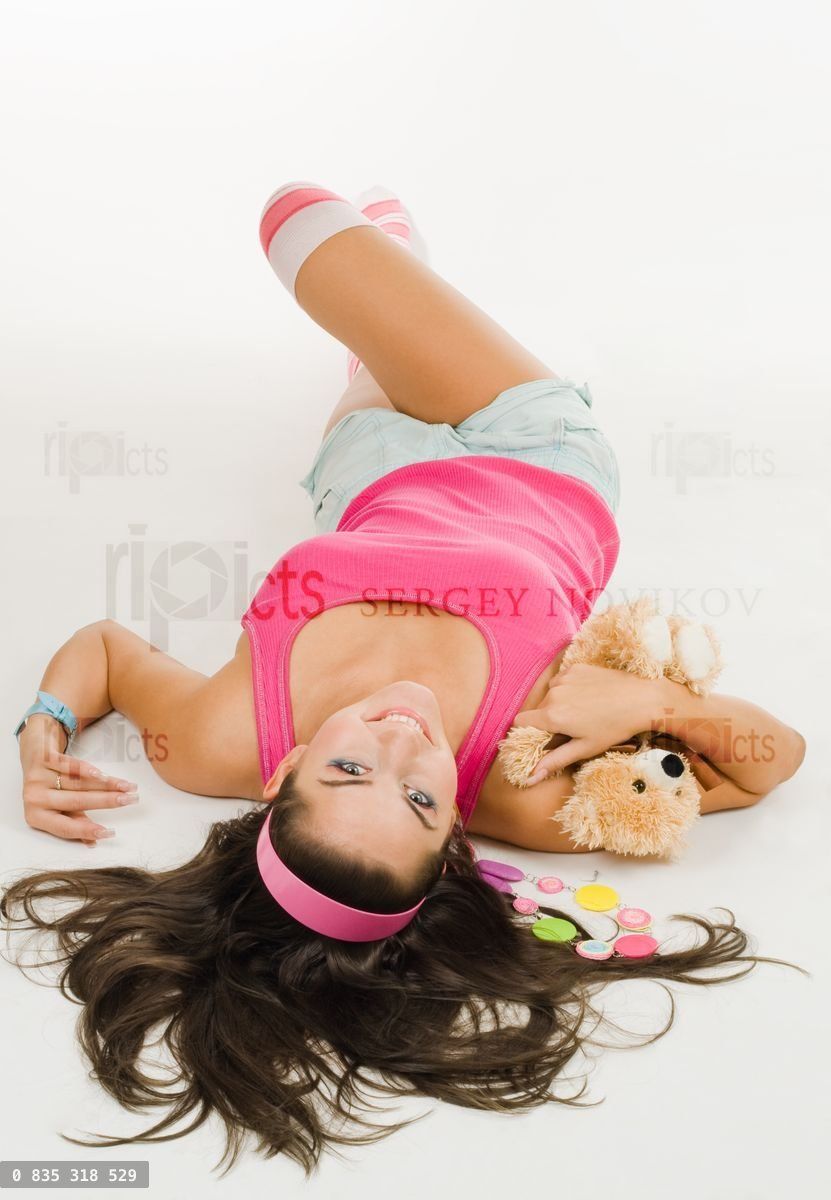 Woman with toy lay on the floor