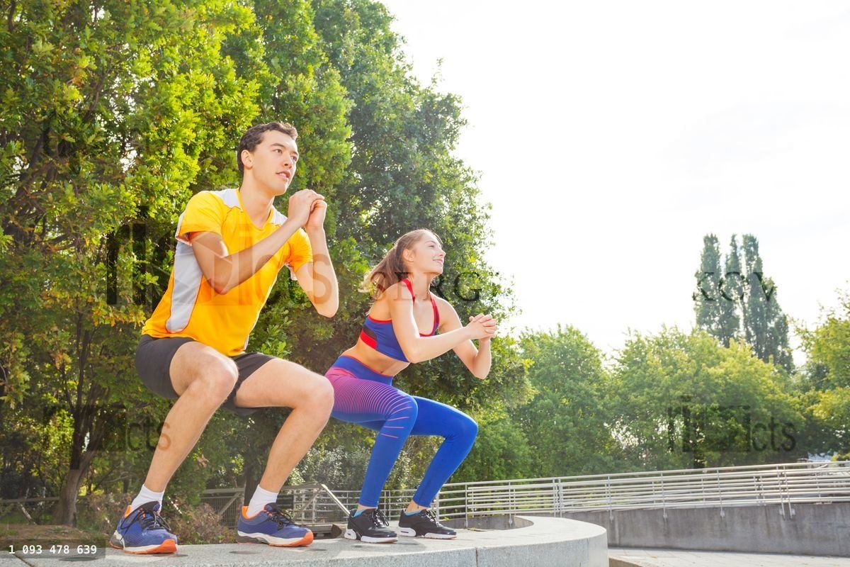 Friends doing jump exercise during crossfit train
