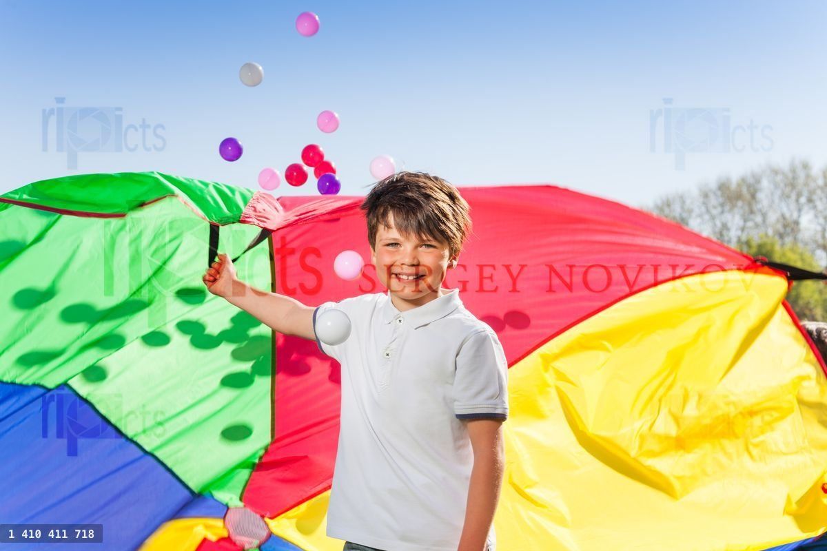 Happy boy playing active outdoor game