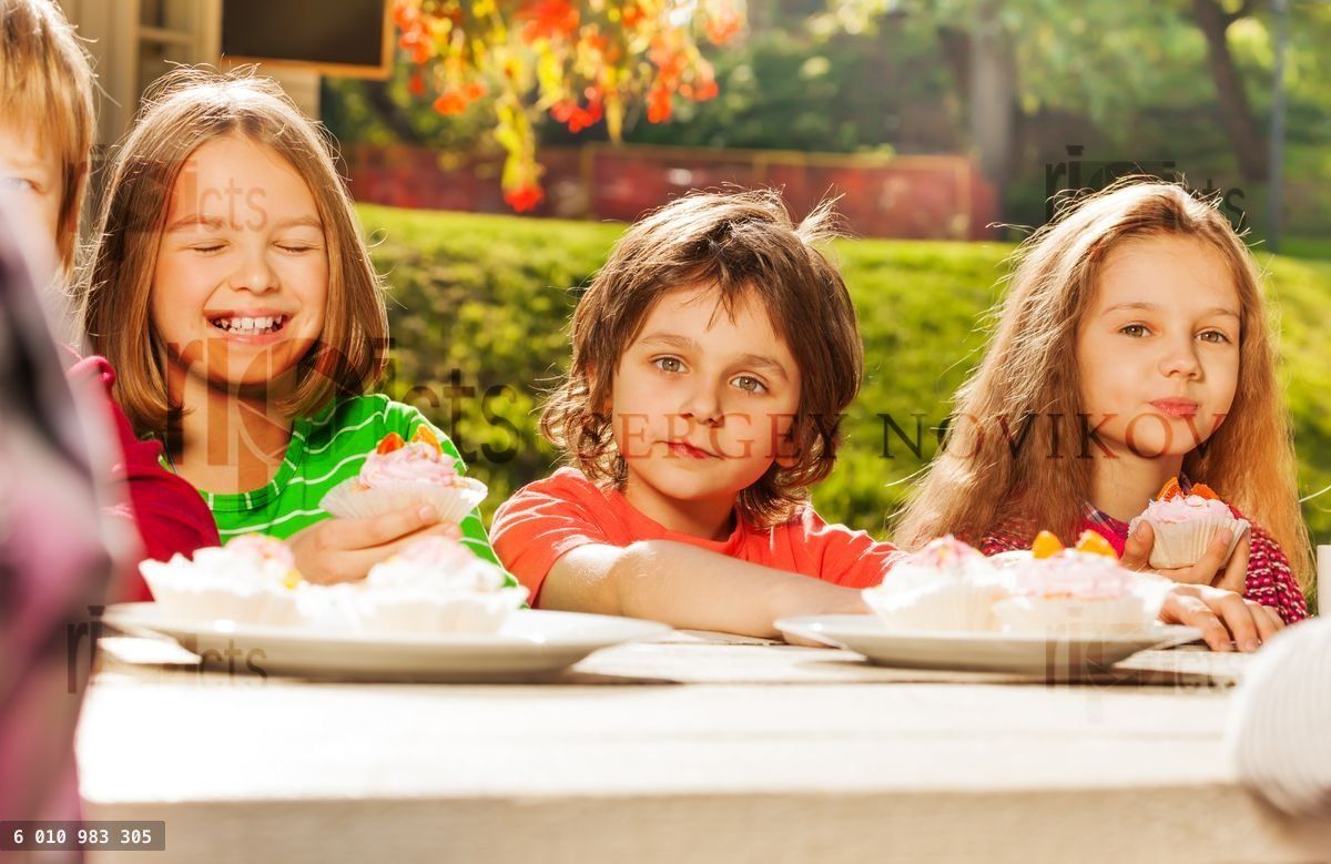 Close up view of happy children sitting together