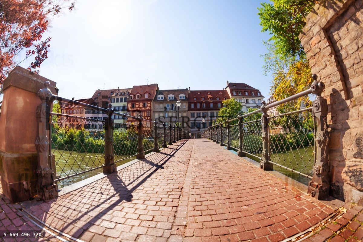 Bridge paved of bricks over Ill river, Strasbourg