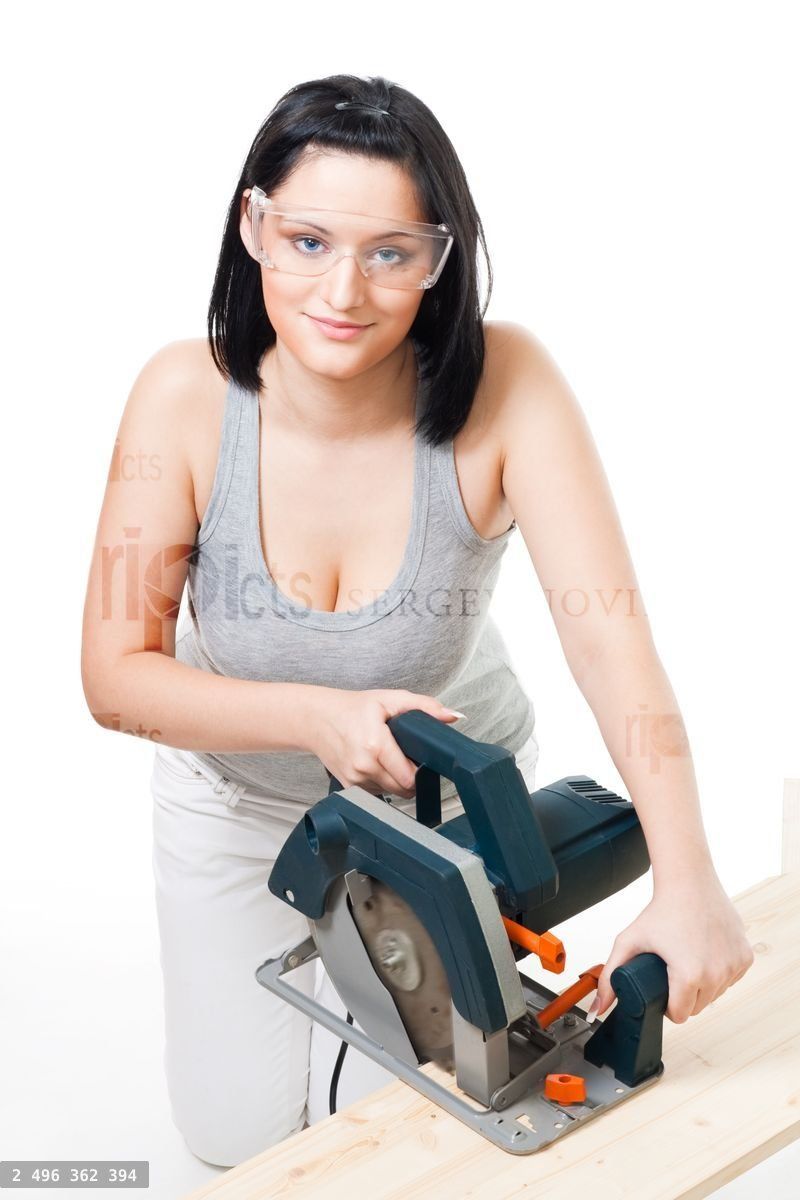 Woman with electric saw
