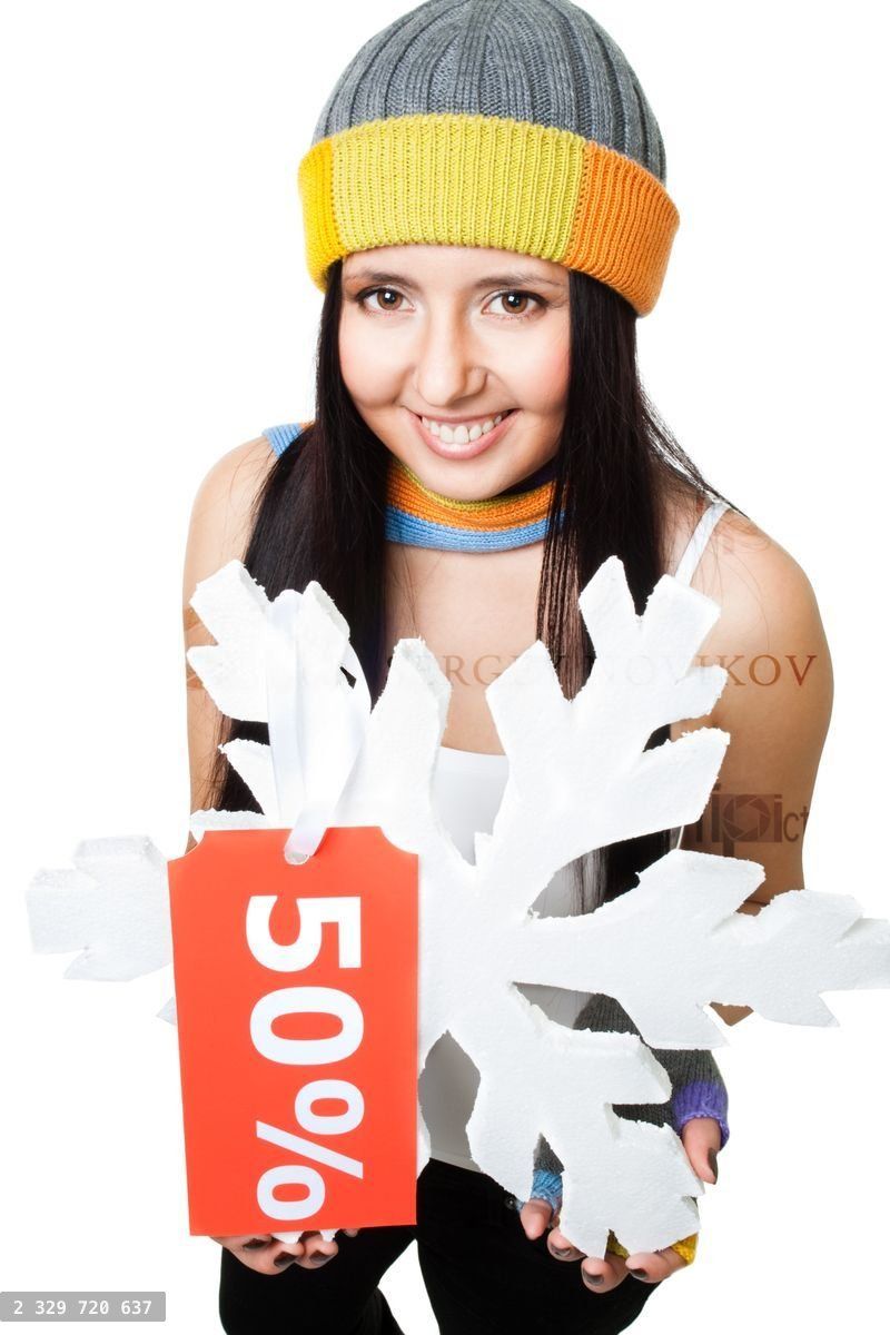 Woman hold snowflake with sale tag