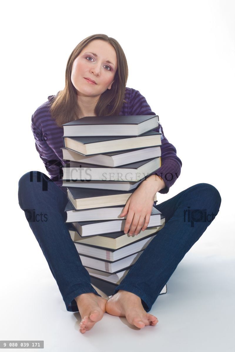 woman with stack of books