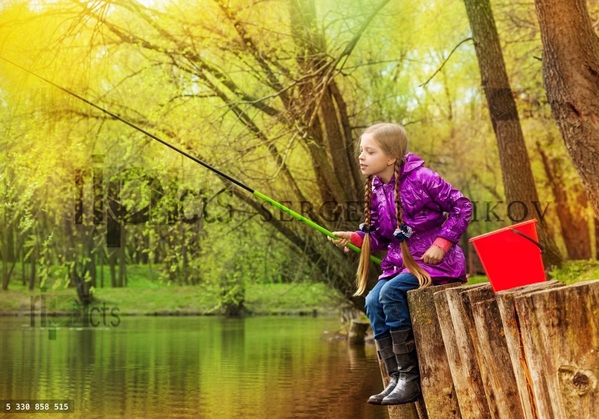 Girl fishing near beautiful pond with fishrod
