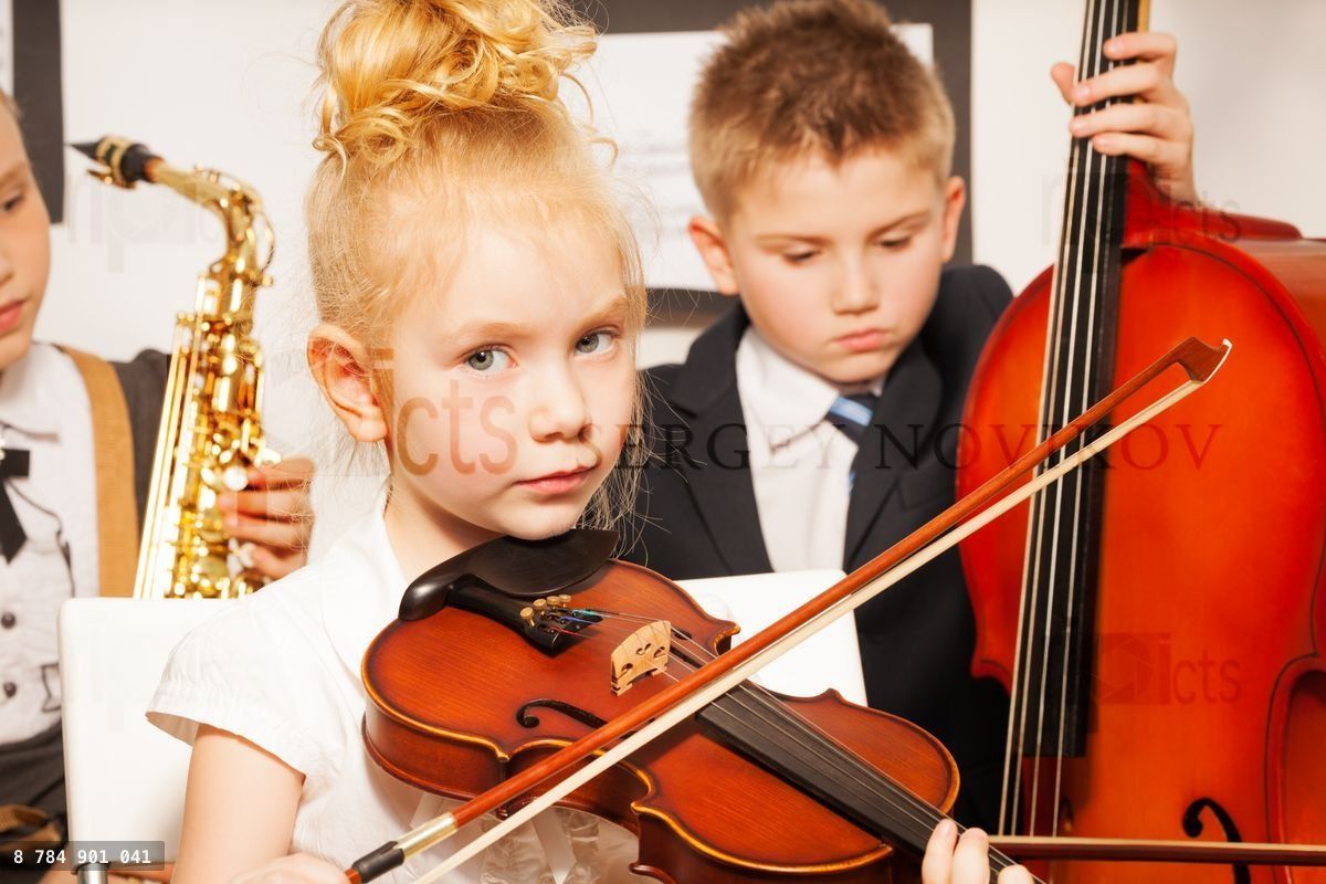 Group of children playing musical instruments