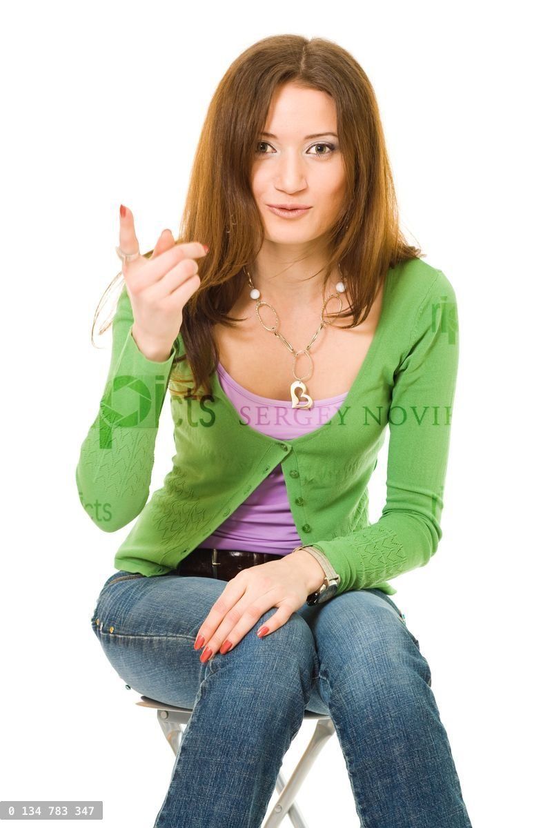 woman gesturing pointing up