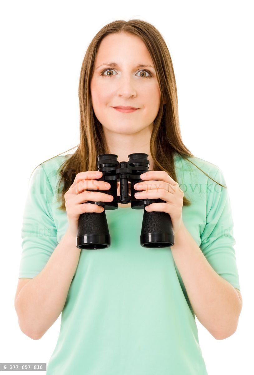 Woman holding pair of glasses