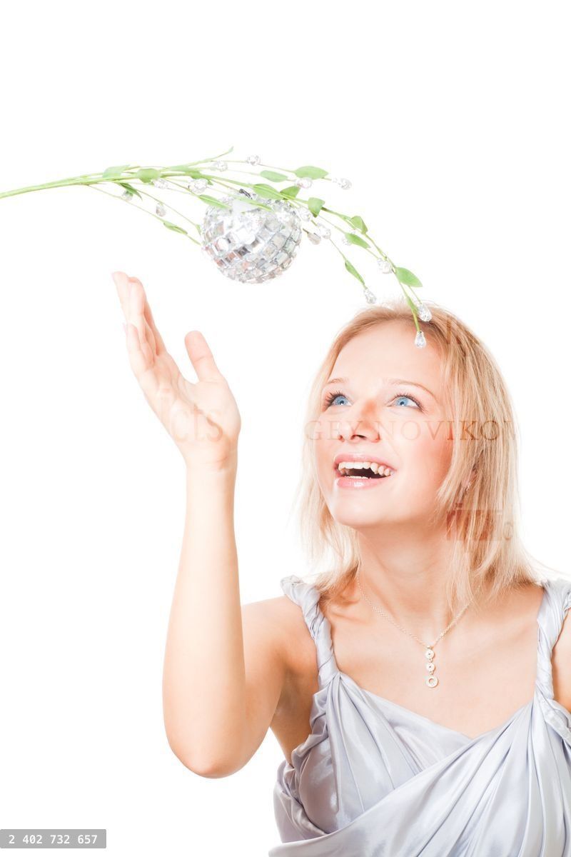 Woman want to tear apple from tree