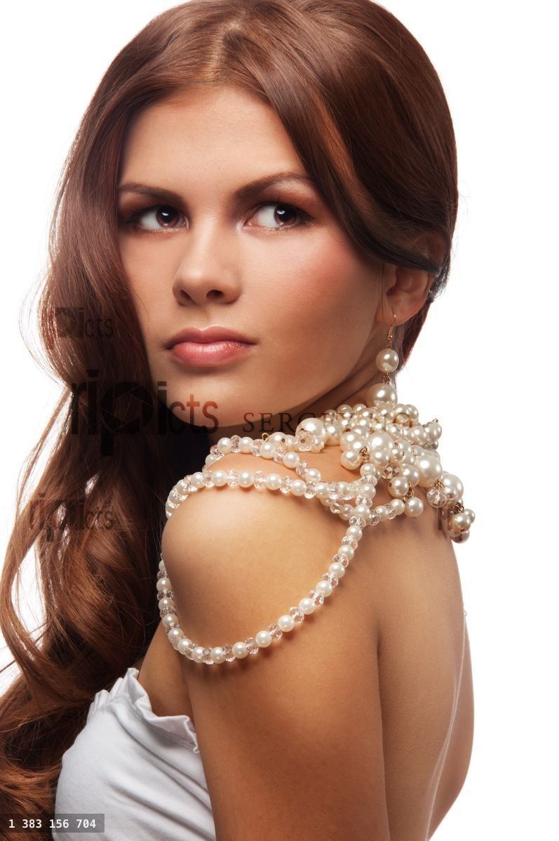 Yung woman with pearls necklace
